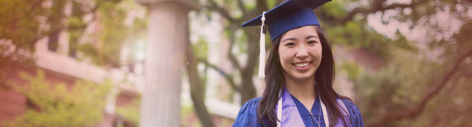 Student in graduation cap and gown